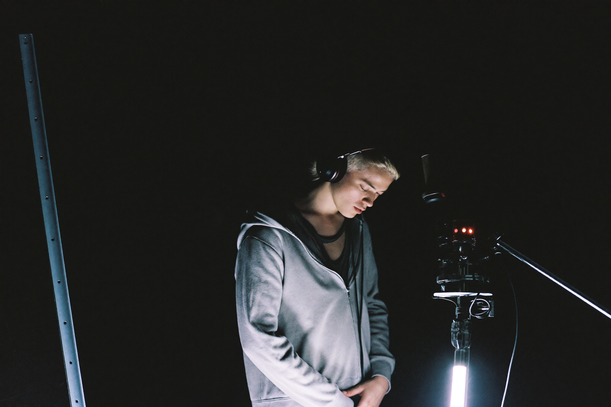 Artist with headphones in the studio